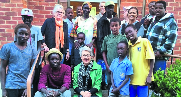 Zacharia and the team connecting with the local community in South Sudan (Photo: Supplied)