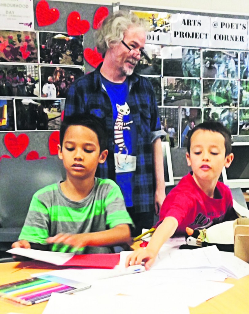 Brothers Cian and Ronan of Alexandria Park Community School with Nicholas Beckett. Photo: Catherine Skipper