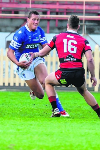 Kane Evans takes on a Bears defender (Photo: Gary Sutherland)