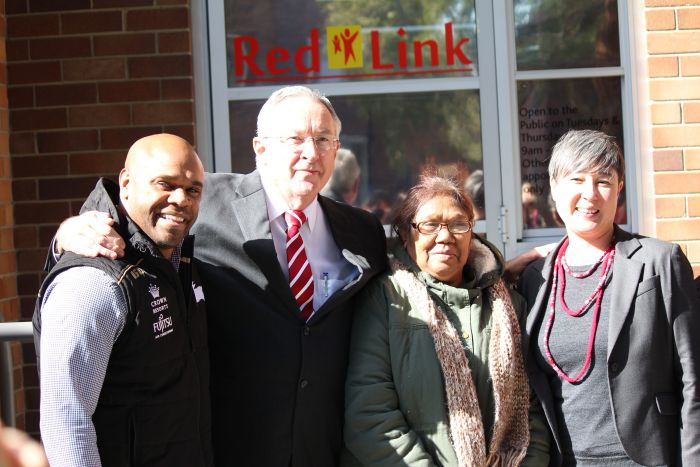 Tenants with Brad Hazzard (second from left) and Jenny Leong (right) at the RedLink opening. Photo: Geoff Turnbull