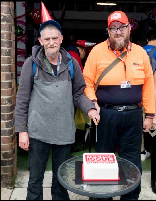 Long serving vendors David S & Marcus cut the cake Photo: Peter Holcroft