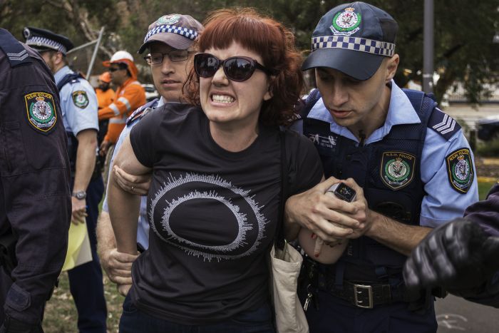 Protester held by cops Photo: Jack Carnegie