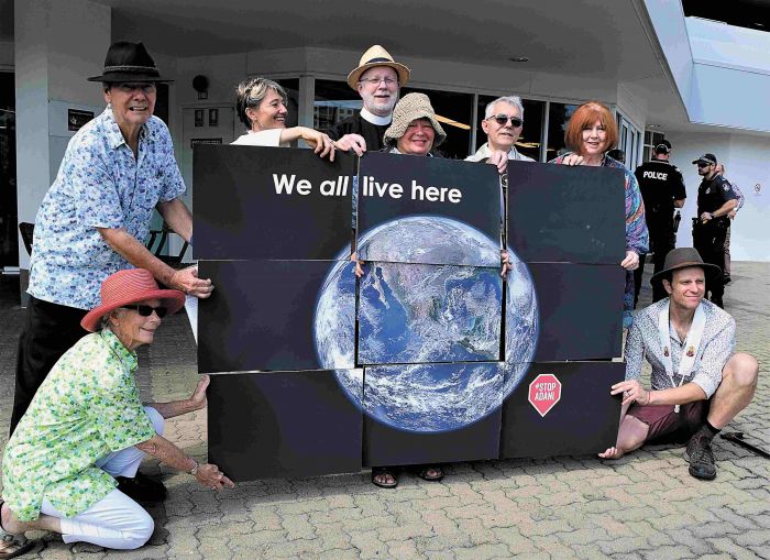 Faith leaders and locals outside Adani headquarters in Townsville on April 18. Photo: Supplied