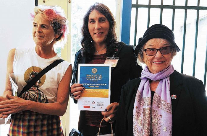 South Sydney Herald Volunteer Award recepients cartoonist norrie, who delivers to Erskineville homes, photographer Ashley Asphodel and Volunteer News writer and co-ordinator Pat Clarke. Photo: supplied