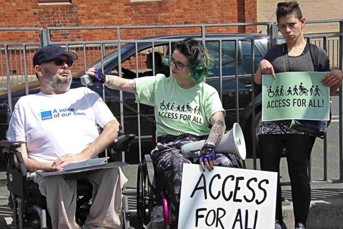 Andrew Emmerson (PWDA), Robin M. Eames and Georgia Rose Cranko (University of Sydney Disabilities Collective) were among those who addressed the rally Photo: Lyn Turnbull