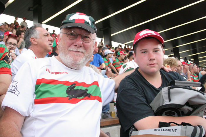 Mick and Sean enjoy the excitement of Return to Redfern on February 9. The Rabbitohs defeated the Papua New Guinea Residents XIII 38-12.(Photo: Andrew Collis)
